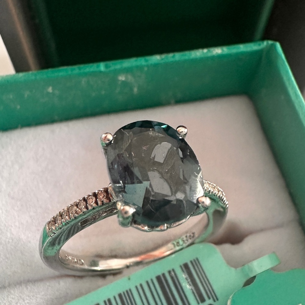 Sophisticated Silver Ring with Deep Blue Gemstone